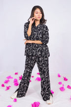Linear Arts - Side Slit Flared Pants - Black